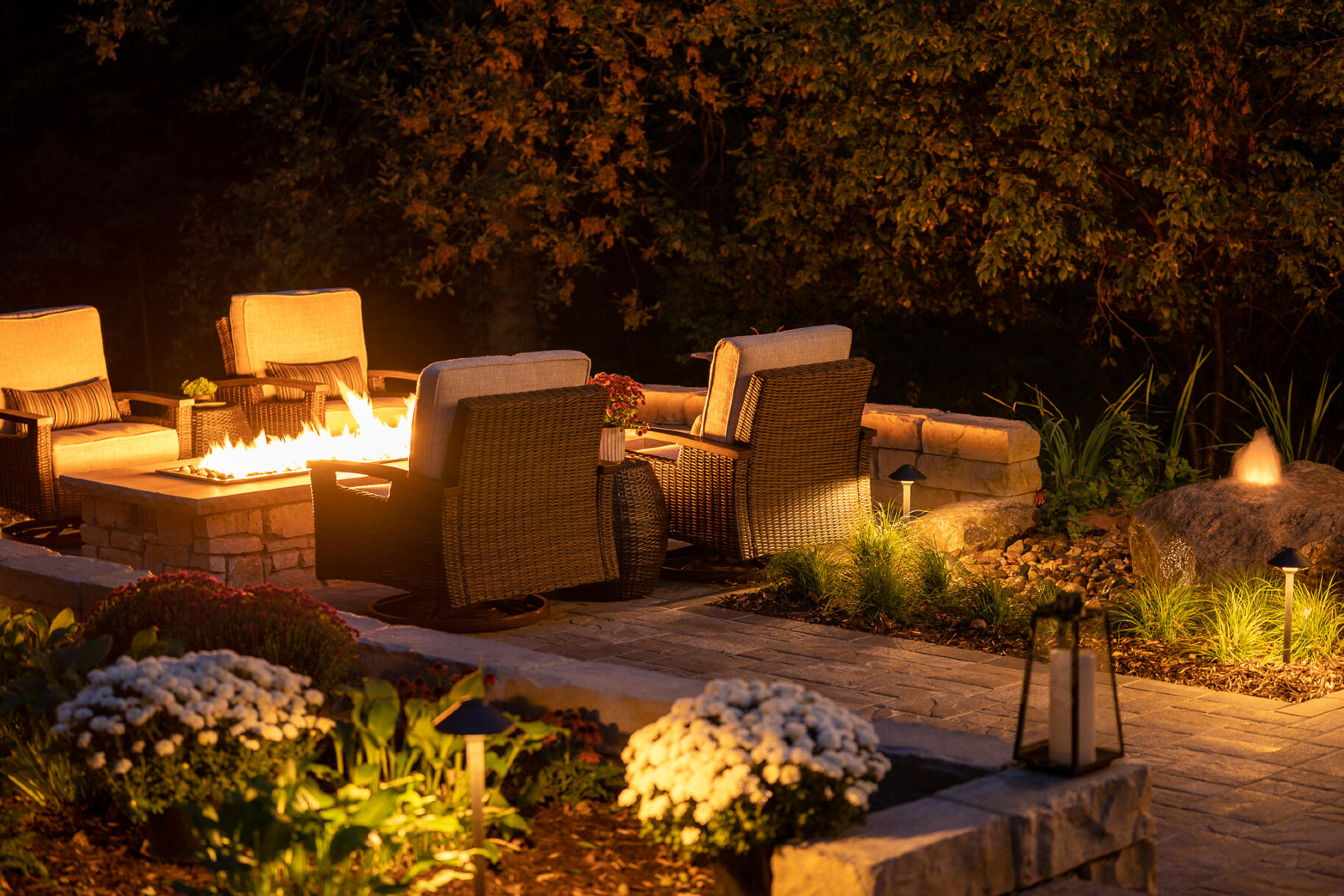 Outdoor patio seating with oblong fireplace for roasting marshmellows